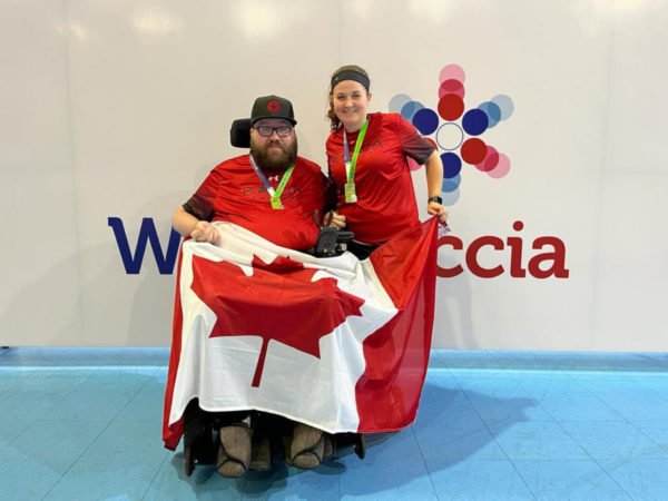 Ryan Rondeau and performance partner, Samantha Leger, celebrating the silver medal win for Canada | Ryan Rondeau et sa partenaire de performance, Samantha Leger, célèbrent la médaille d'argent remportée par le Canada